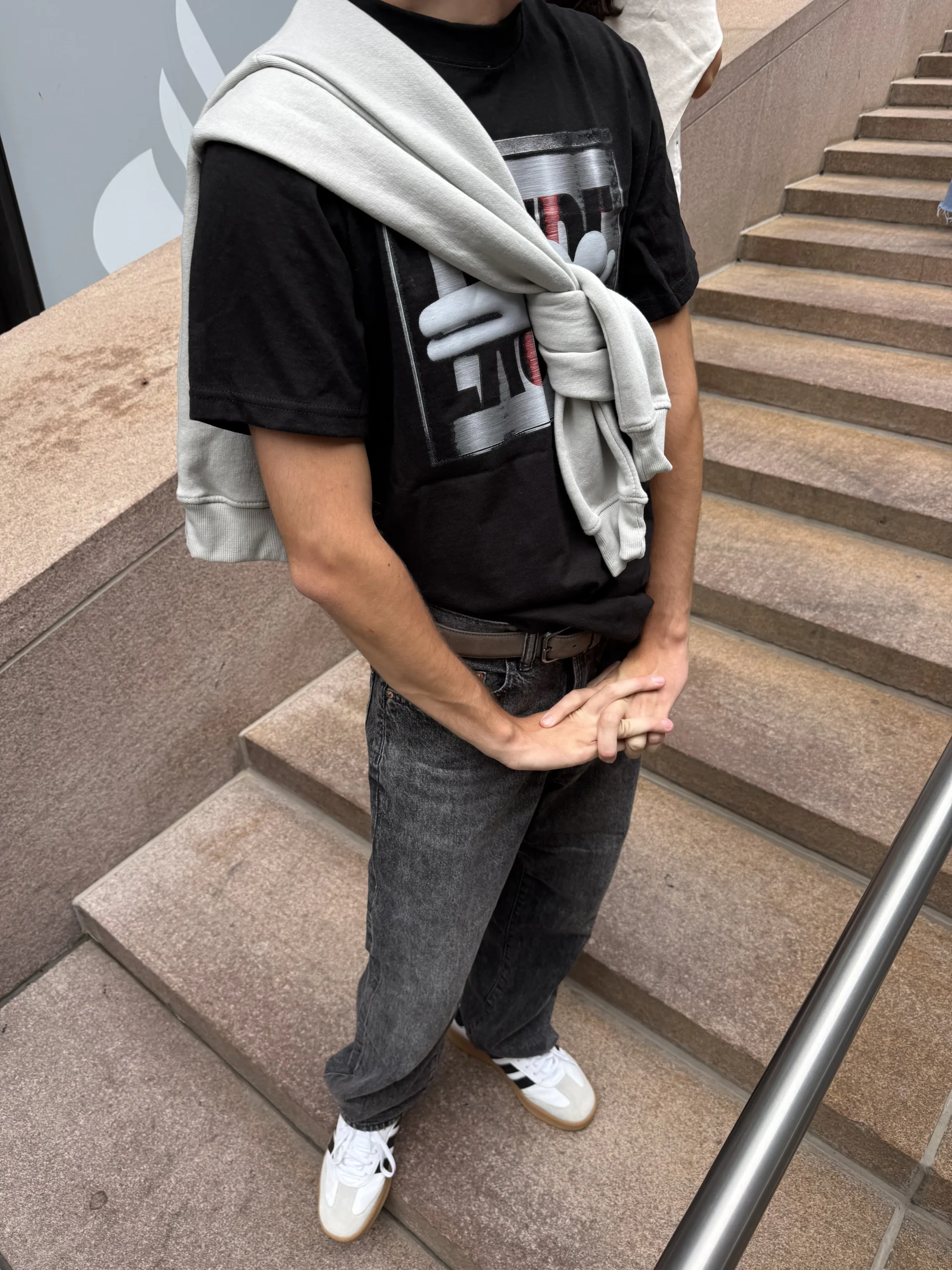 chaplya mecha chameleon game 2 heavyweight tshirt stairs Model wearing CHAPLYA × Mecha Chameleon Game 2 Heavyweight T-Shirt on stairs